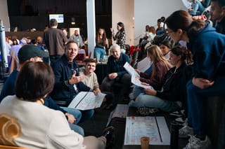 Conference attendees in small group discussion during a StronG Church breakout session